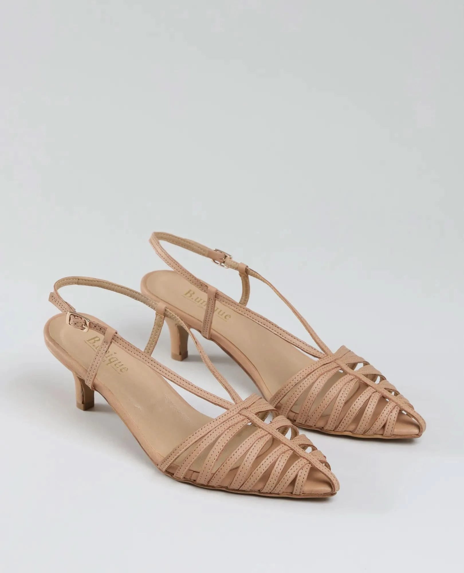Elegant nude סנדלי עקב- מיכאלה: strappy slingback heels with pointed toes, low kitten heels, and a woven front design—perfect נעלי נשים for any occasion, shown on a plain light background.